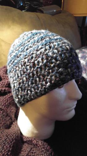 Crochet Hat, Single layer, greys and blacks, blue stripes. $20